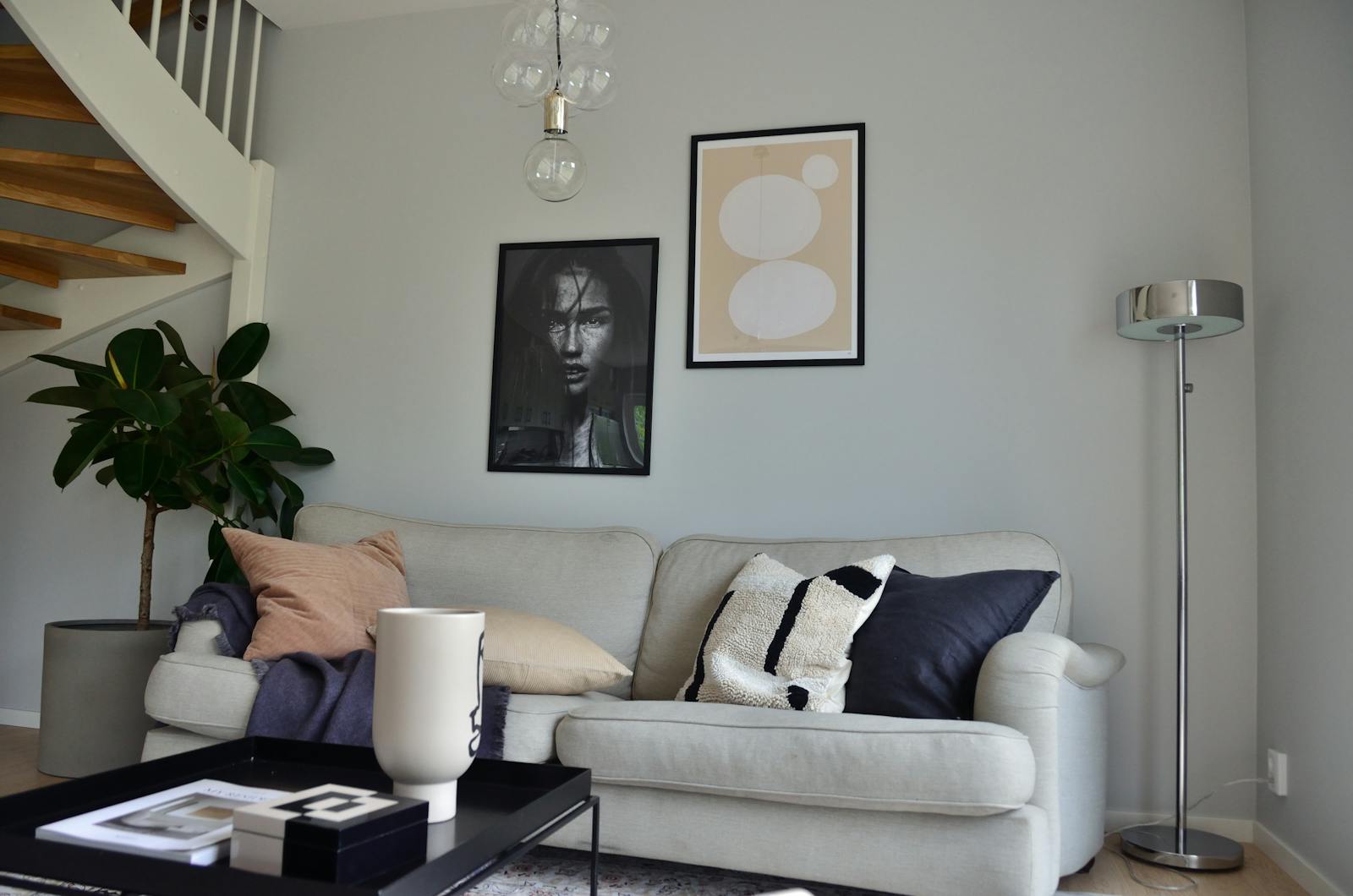 Cozy Scandinavian living room with stylish decor and comfortable seating.